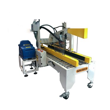 may dan hop carton voi keo nhiet hinh 1